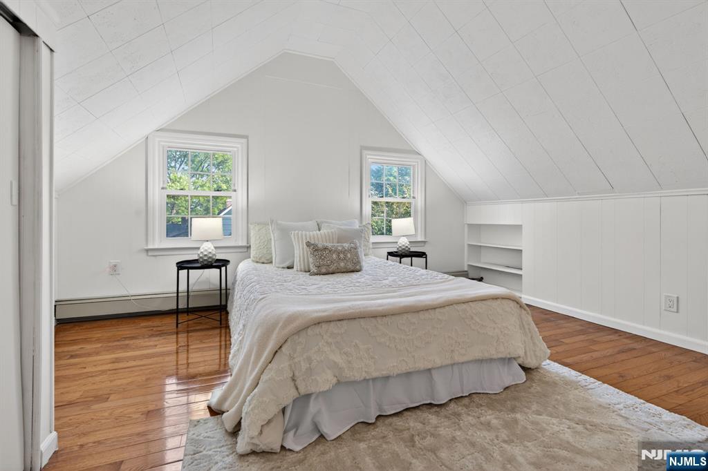 85 Whitney Road Short Hills, NJ 07078 - Photo 27 of 34 a bedroom with a bed and a window