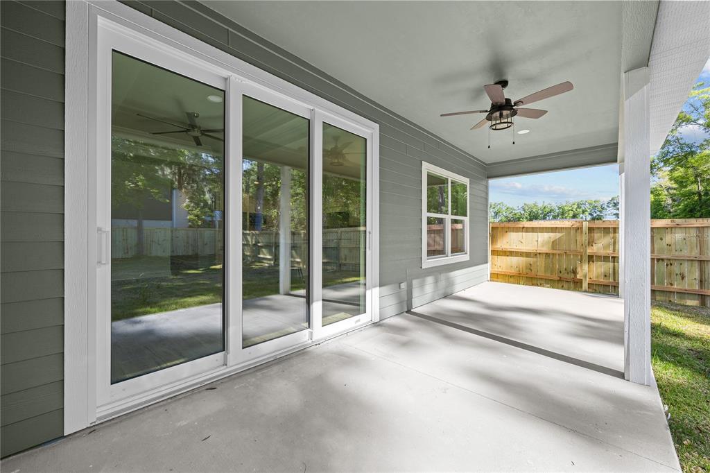1086 Southwest 67th Drive Gainesville, FL 32607 - Photo 33 of 37 a view of a porch with a garden