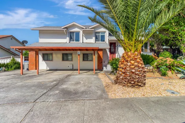 front view of a house with a street
