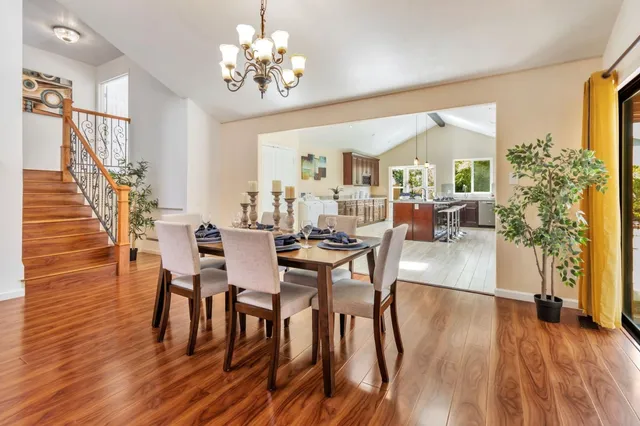 a workspace room with furniture and wooden floor