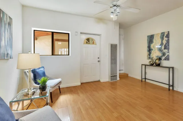 a kitchen with a table and chairs in it