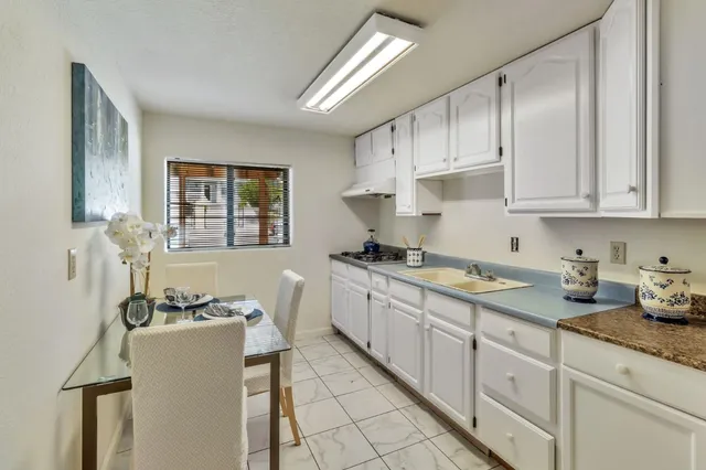 a view of yard with patio