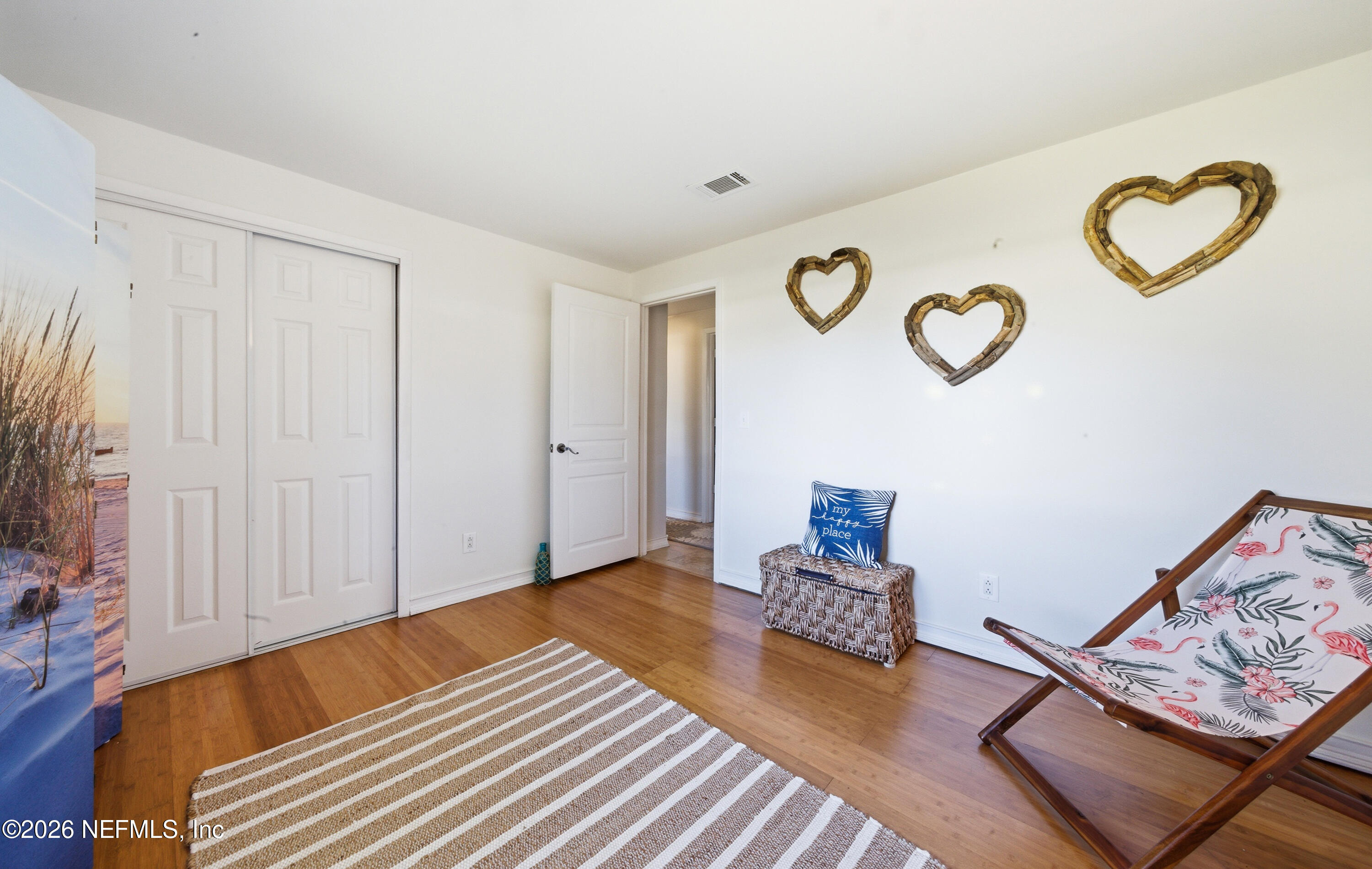 147 Knight Boxx Road Middleburg, FL 32068 - Photo 20 of 30 a bedroom with a bed and a couch