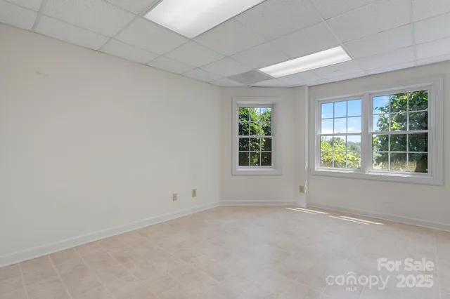 a view of an empty room with cabinet