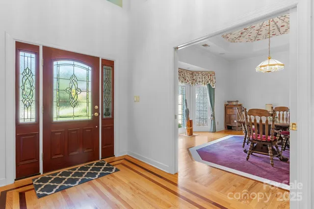 a view of a livingroom with furniture and a table