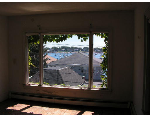 126 Front Street Marblehead, MA 01945 - Photo 4 of 14 a view of backyard and a garden