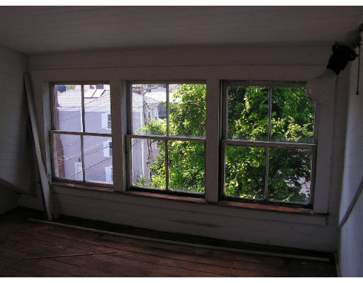 126 Front Street Marblehead, MA 01945 - Photo 8 of 14 a view of a black and white wooden floor