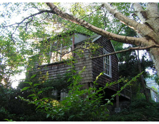126 Front Street Marblehead, MA 01945 - Photo 10 of 14 a backyard of a house with lots of green space