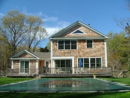 38 Fresh Pond Road Sag Harbor, NY 11963 - Photo 1 of 1 a front view of a house with a yard
