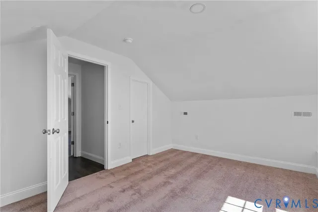 a view of hallway with closet