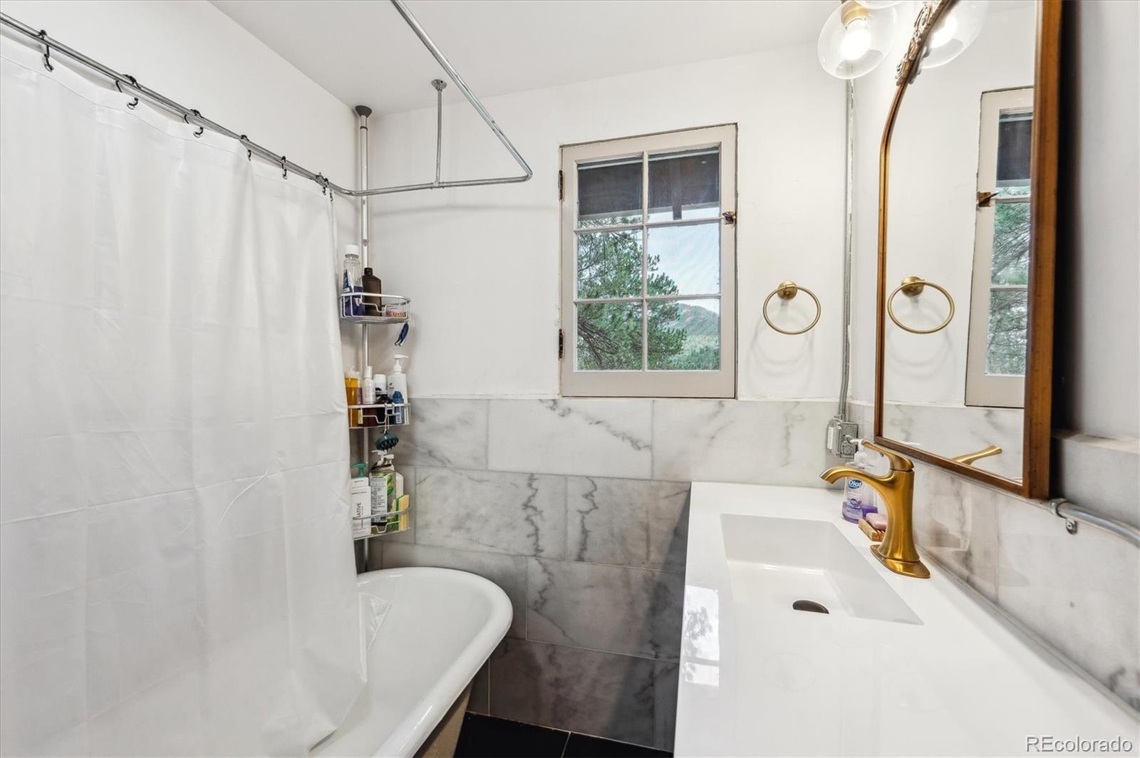 28423 Kinnikinnick Road Evergreen, CO 80439 - Photo 17 of 37 Gallery Image 17
