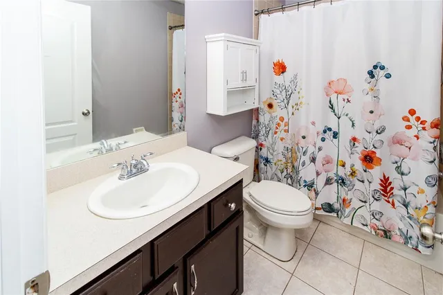 a bed room with a bed and a window