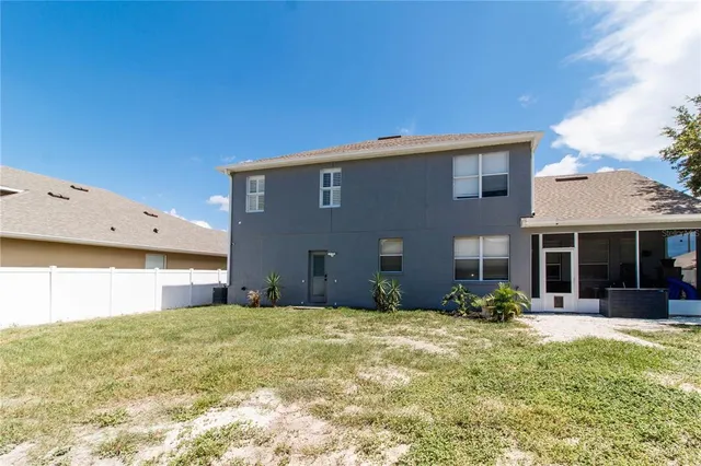 a view of a wooden door of the house