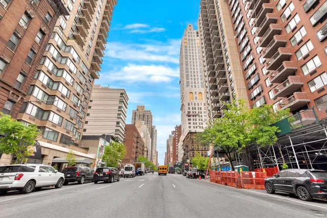 a view of a city with tall buildings in the background