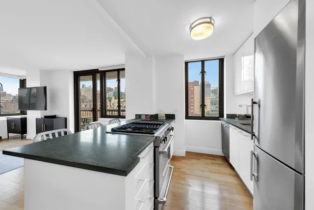 a picture of a room with a sink and furniture