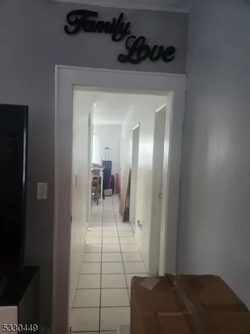 a kitchen with stainless steel appliances granite countertop a sink and a refrigerator
