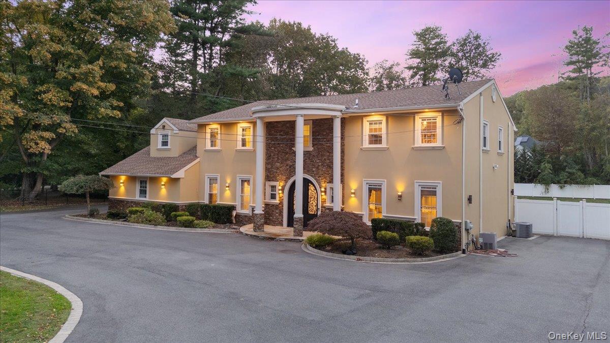626 Caledonia Road Dix Hills, NY 11746 - Photo 2 of 50 Greek revival house featuring stucco siding and stone siding