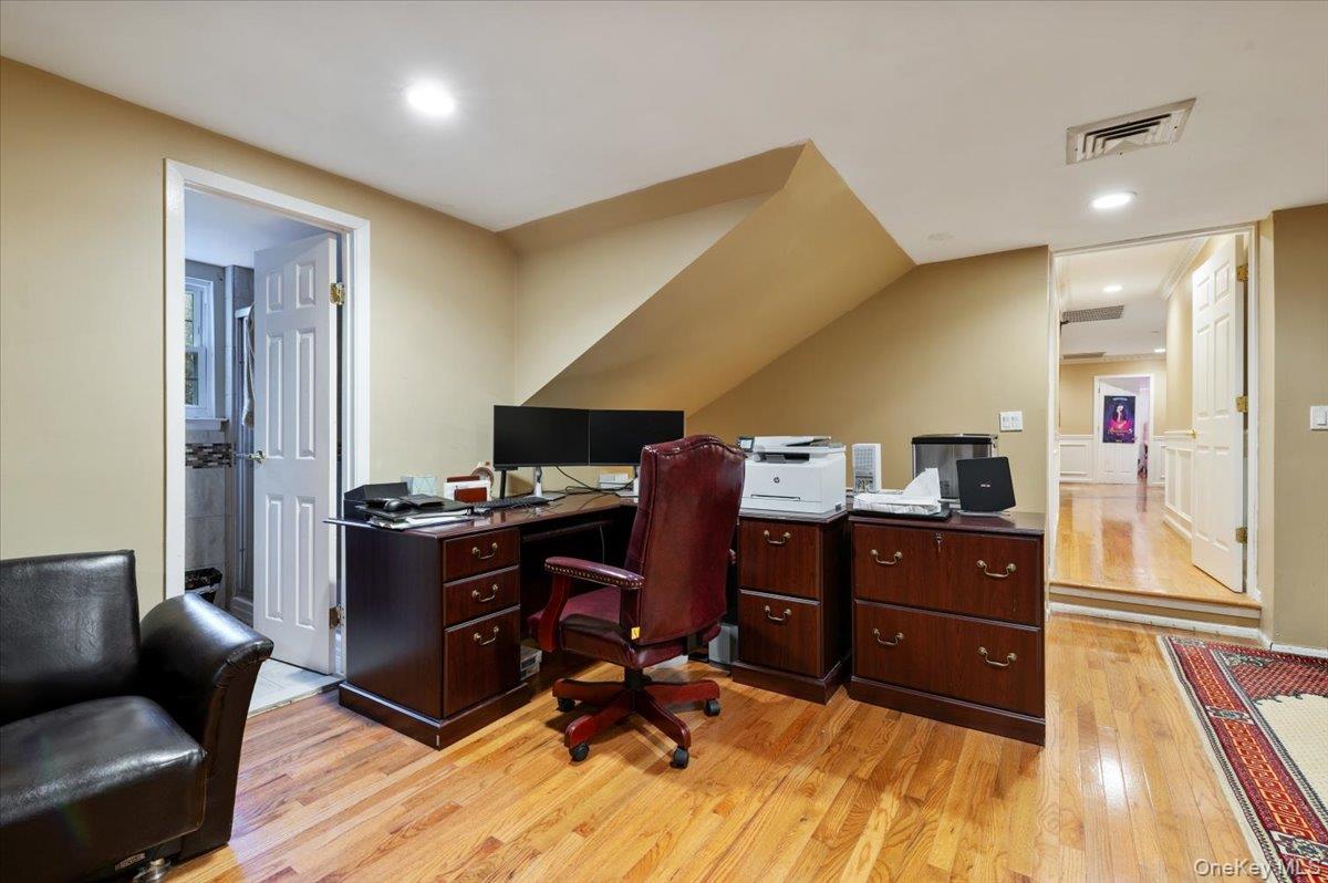 626 Caledonia Road Dix Hills, NY 11746 - Photo 36 of 50 Office with light wood-style floors and recessed lighting