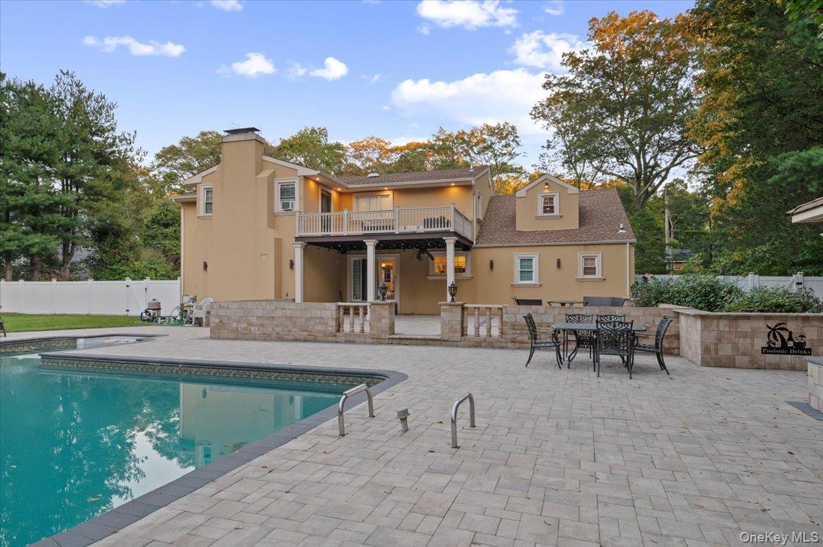 626 Caledonia Road Dix Hills, NY 11746 - Photo 41 of 50 View of swimming pool featuring a patio area, outdoor dining area, and a fenced backyard