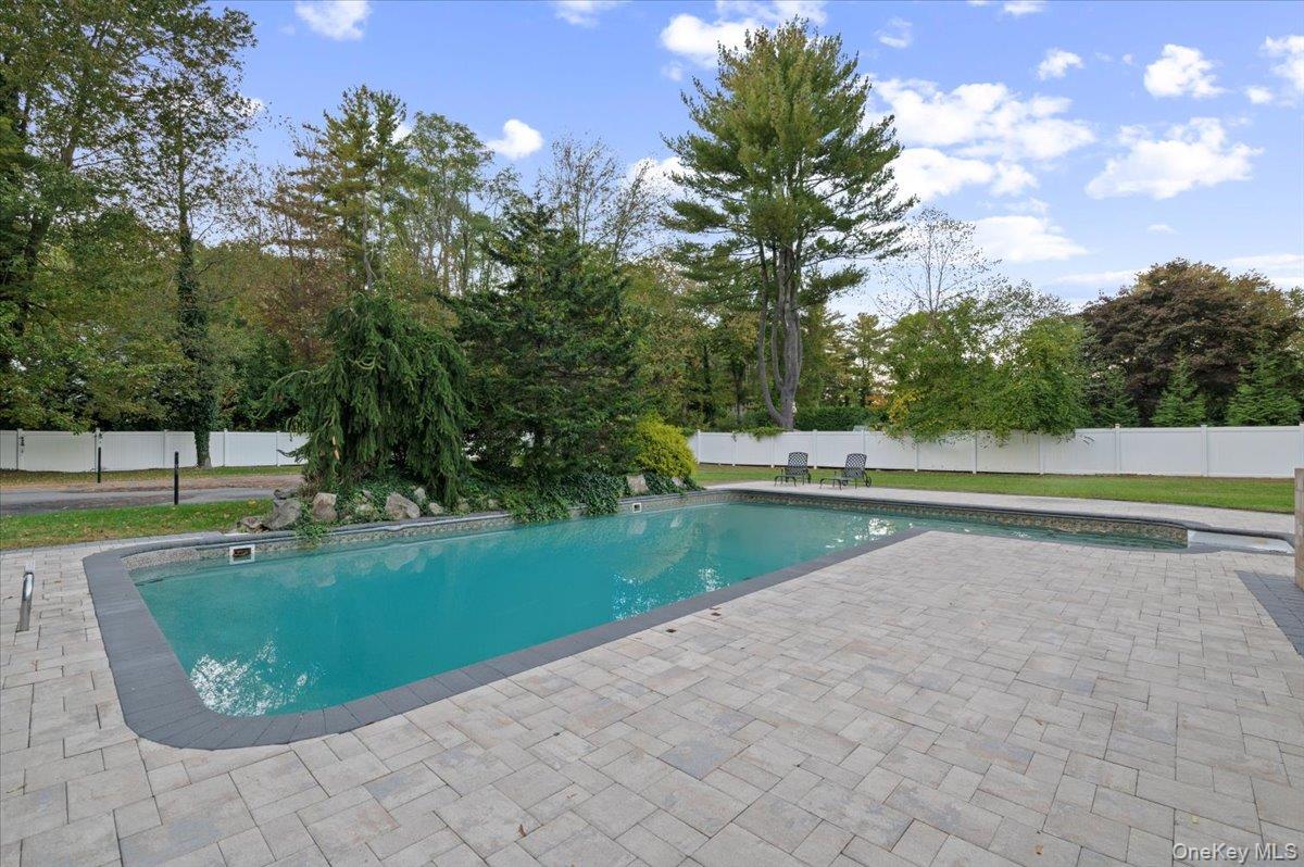 626 Caledonia Road Dix Hills, NY 11746 - Photo 42 of 50 View of swimming pool featuring a fenced backyard and a patio