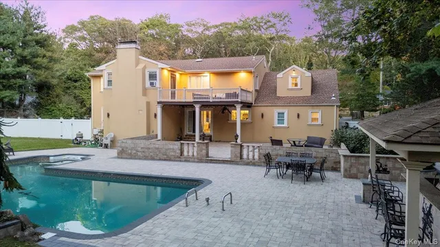 a view of house with outdoor seating space