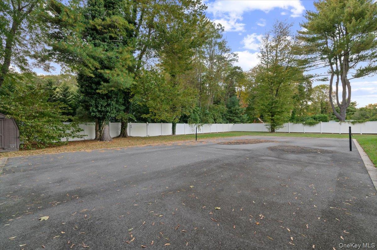 626 Caledonia Road Dix Hills, NY 11746 - Photo 45 of 50 View of asphalt driveway