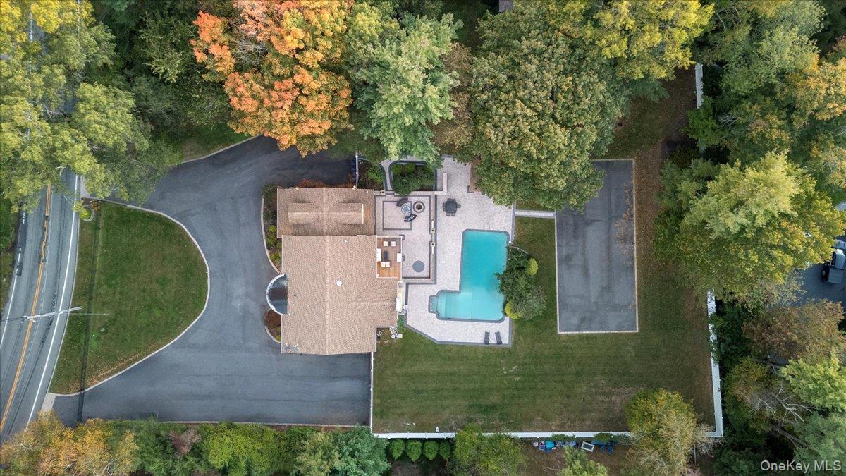 626 Caledonia Road Dix Hills, NY 11746 - Photo 48 of 50 Aerial view of property and surrounding area featuring a pool