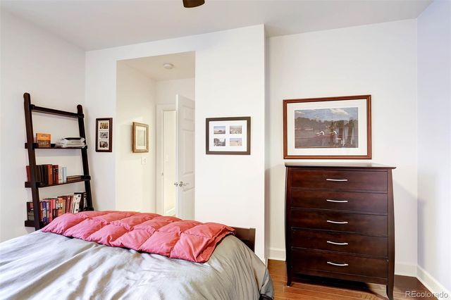 a bedroom with a bed and closet