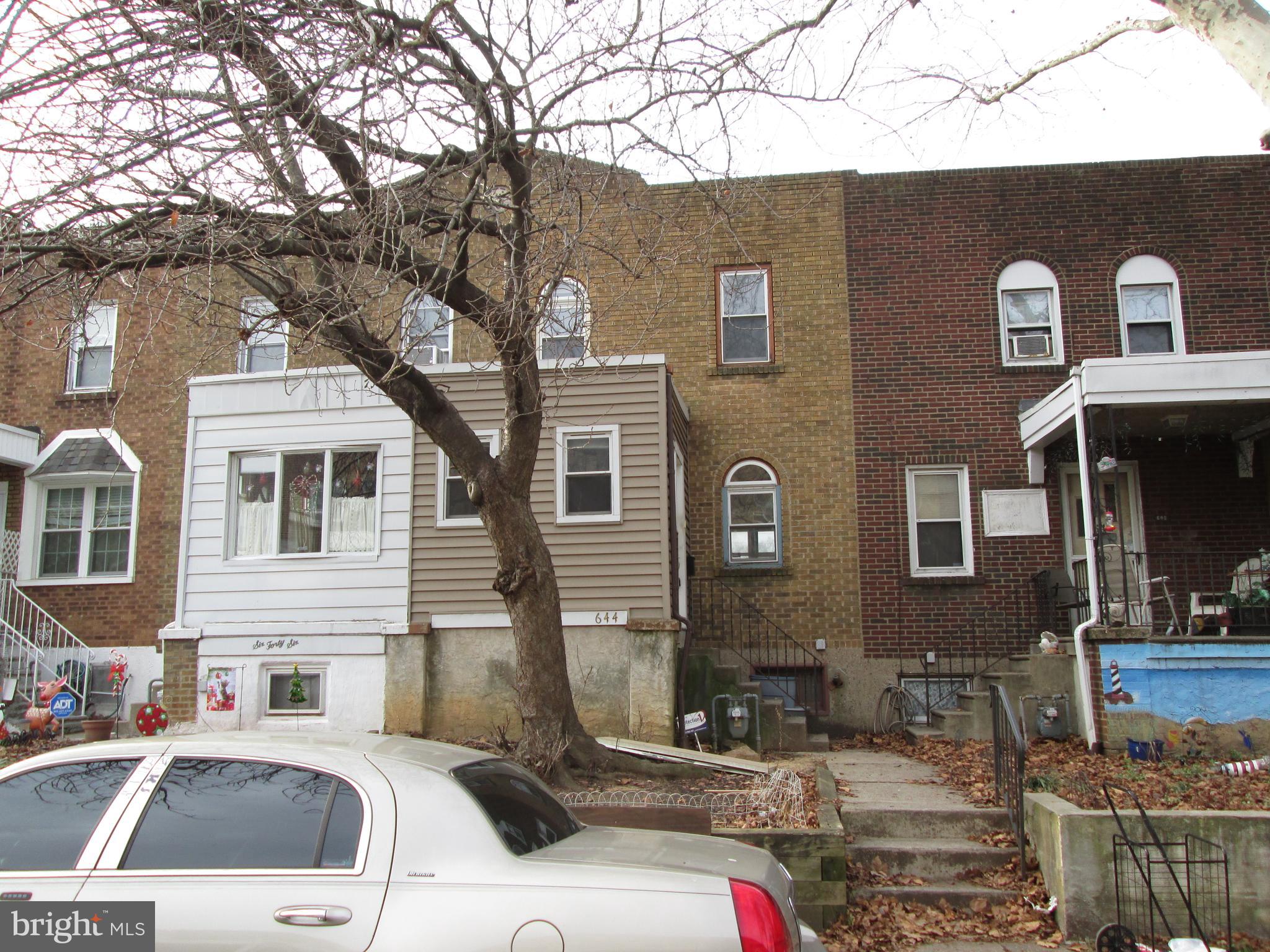 644 Copley Road Upper Darby, PA 19082 - Photo 1 of 47 a front view of a house with a yard