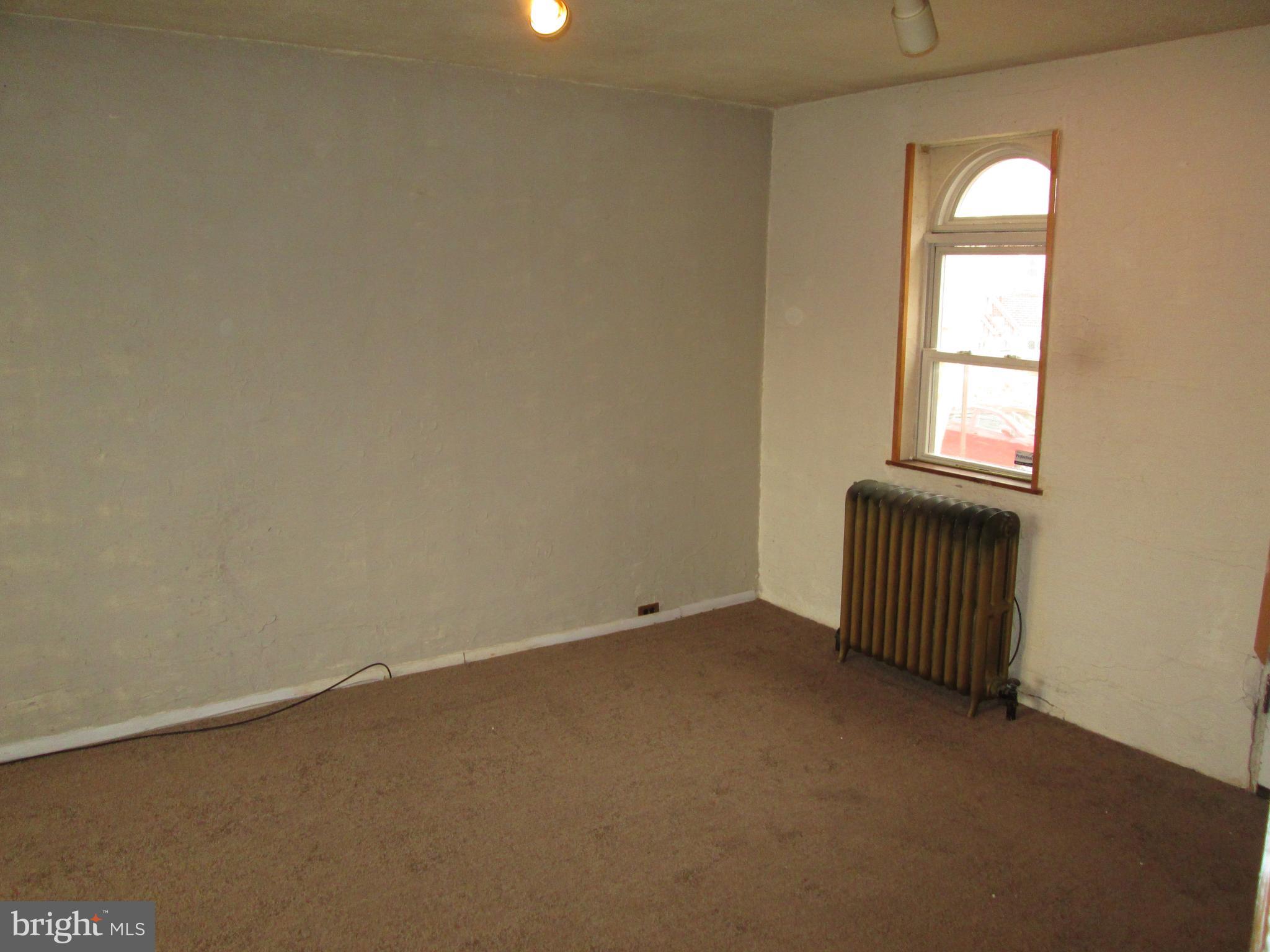 644 Copley Road Upper Darby, PA 19082 - Photo 12 of 47 an empty room with windows