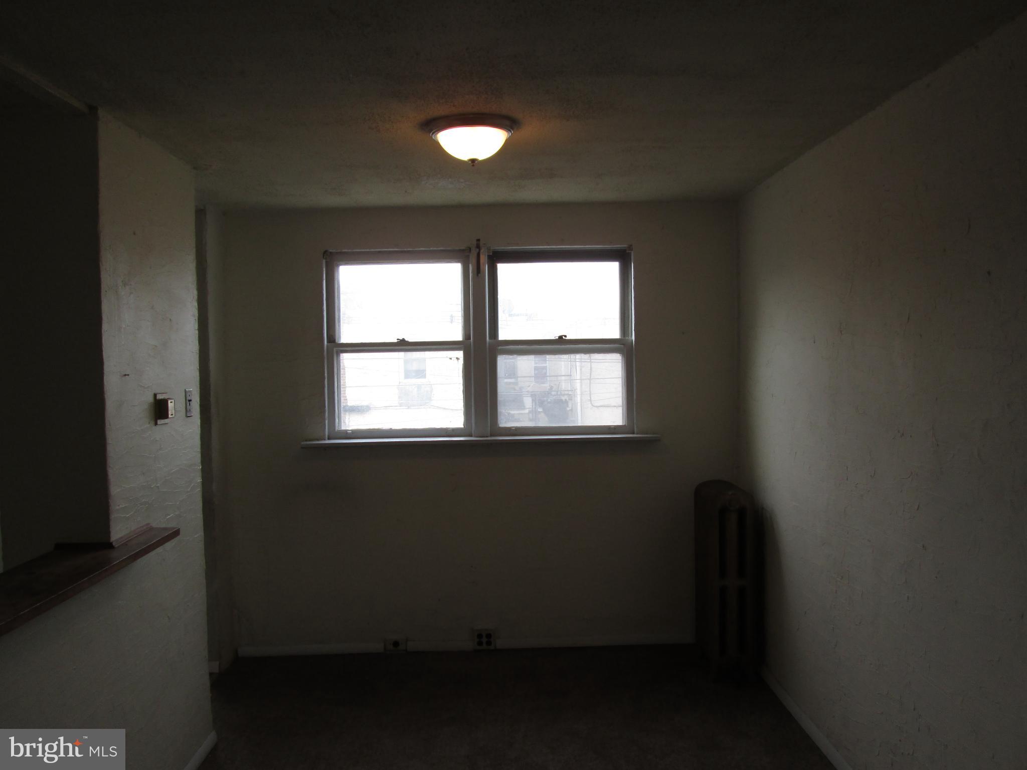 644 Copley Road Upper Darby, PA 19082 - Photo 13 of 47 a view of an empty room with a window