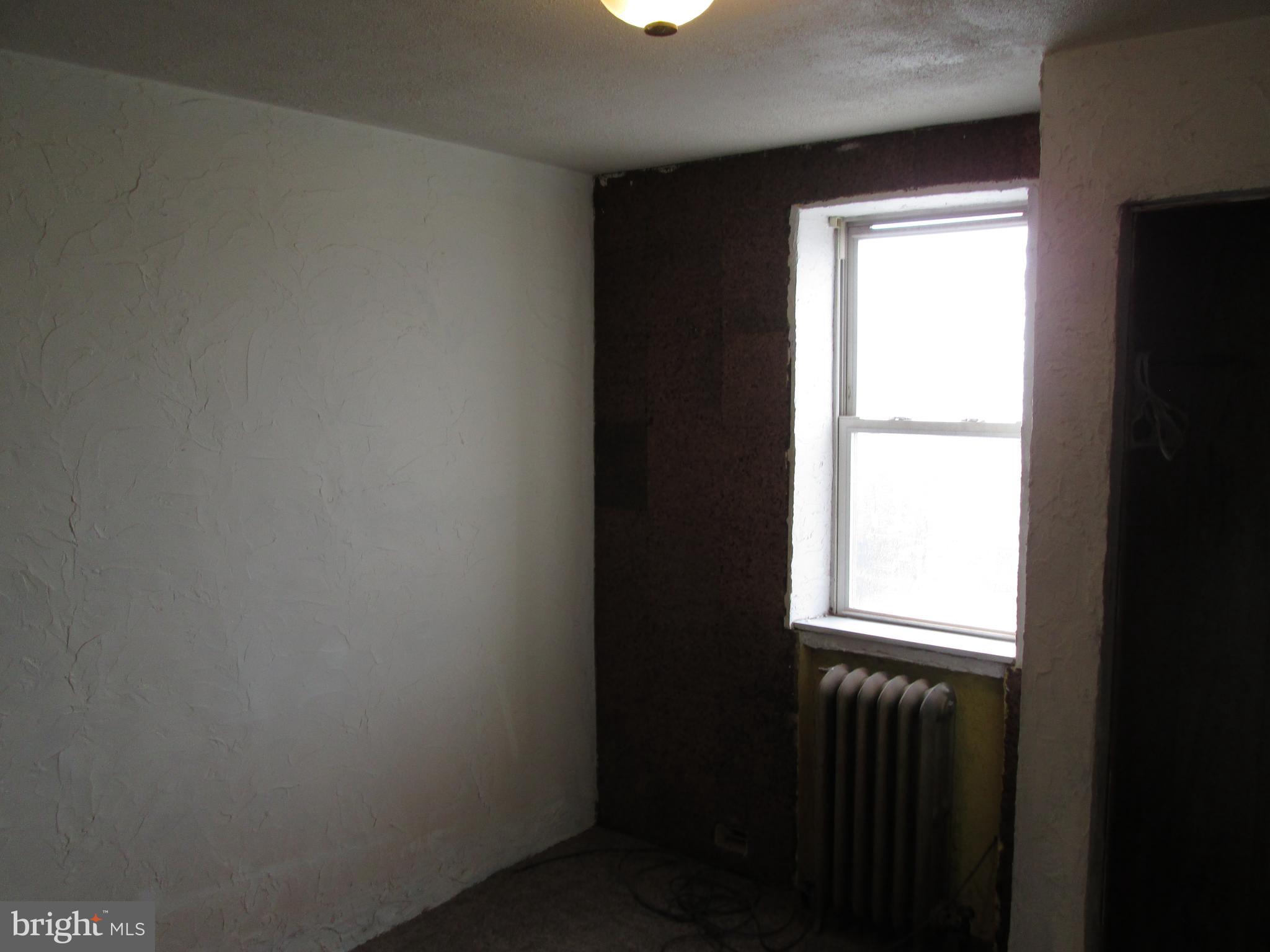 644 Copley Road Upper Darby, PA 19082 - Photo 33 of 47 a view of an empty room with a window