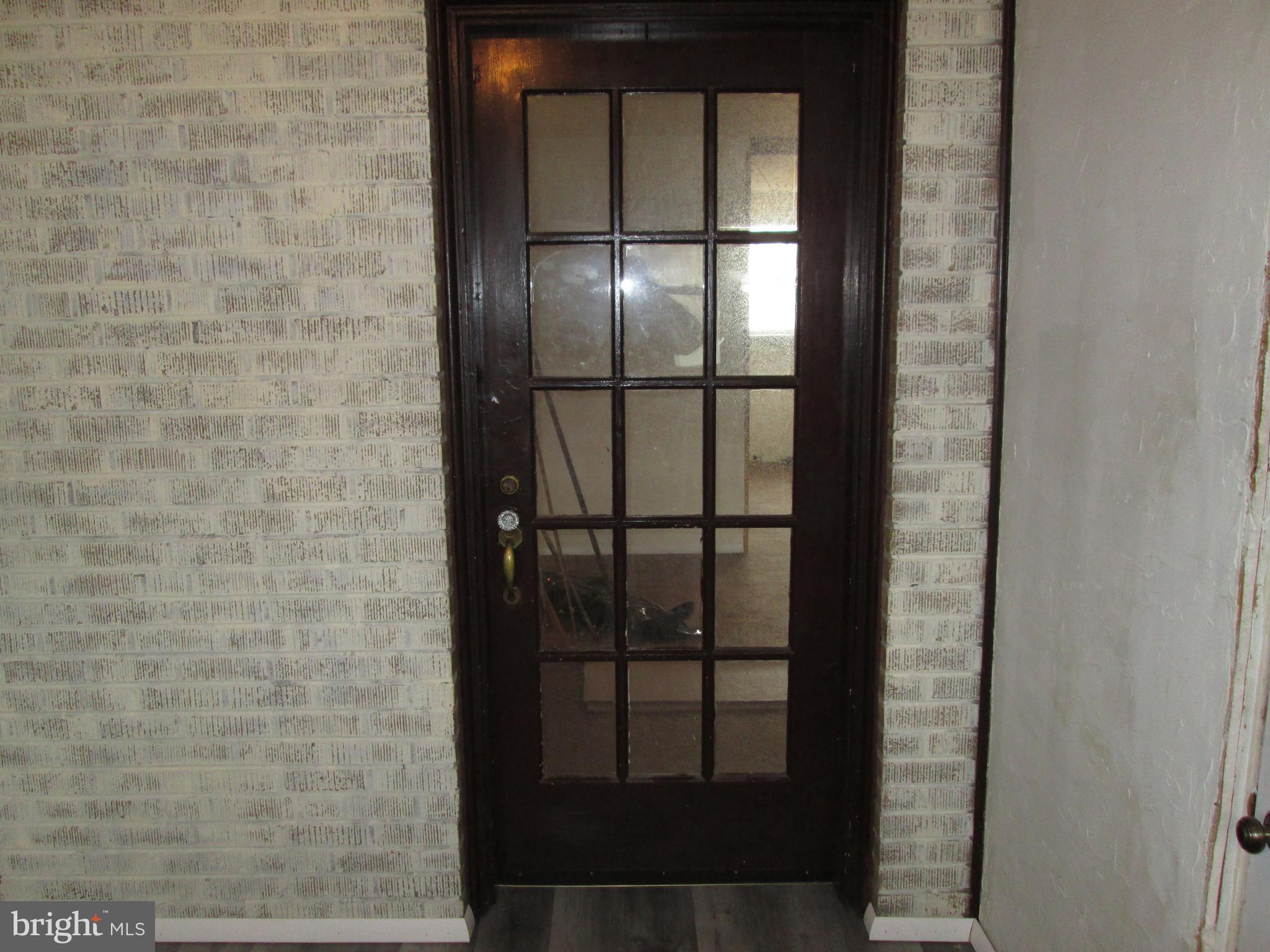 644 Copley Road Upper Darby, PA 19082 - Photo 5 of 47 a bathroom with a glass door