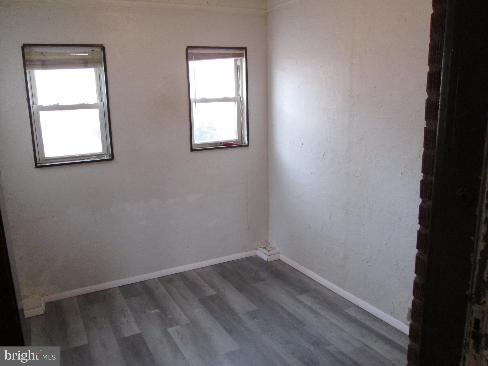 644 Copley Road Upper Darby, PA 19082 - Photo 7 of 47 an empty room with a window