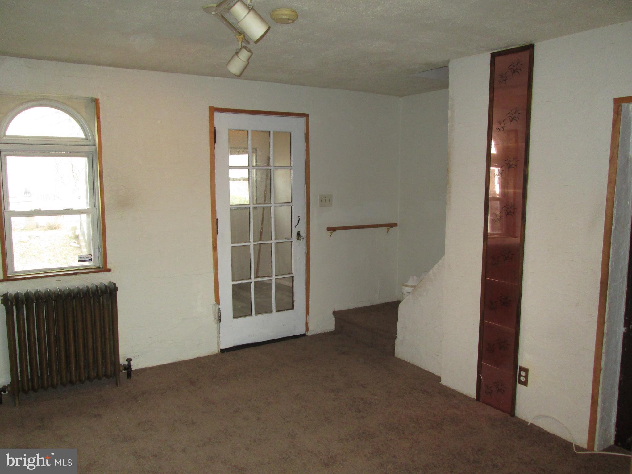 644 Copley Road Upper Darby, PA 19082 - Photo 10 of 47 an empty room with windows