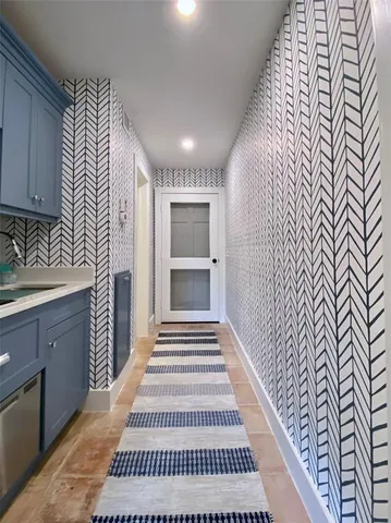 a hallway with cabinets