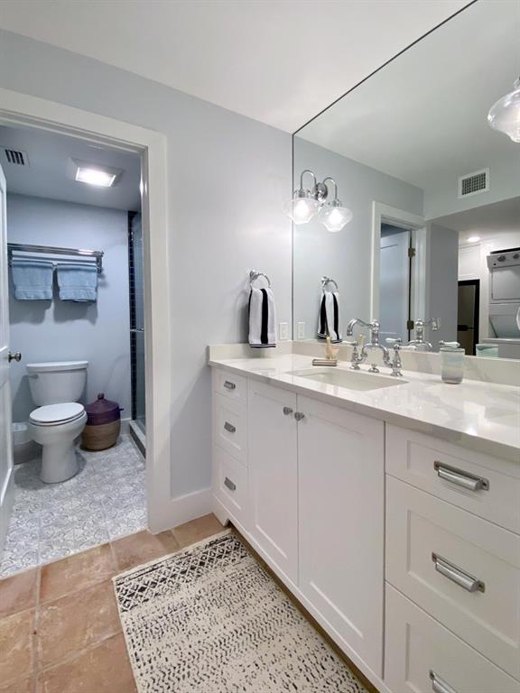 400 Beach Road, Unit 150 Vero Beach, FL 32963 - Photo 16 of 21 a bathroom with a sink and a mirror