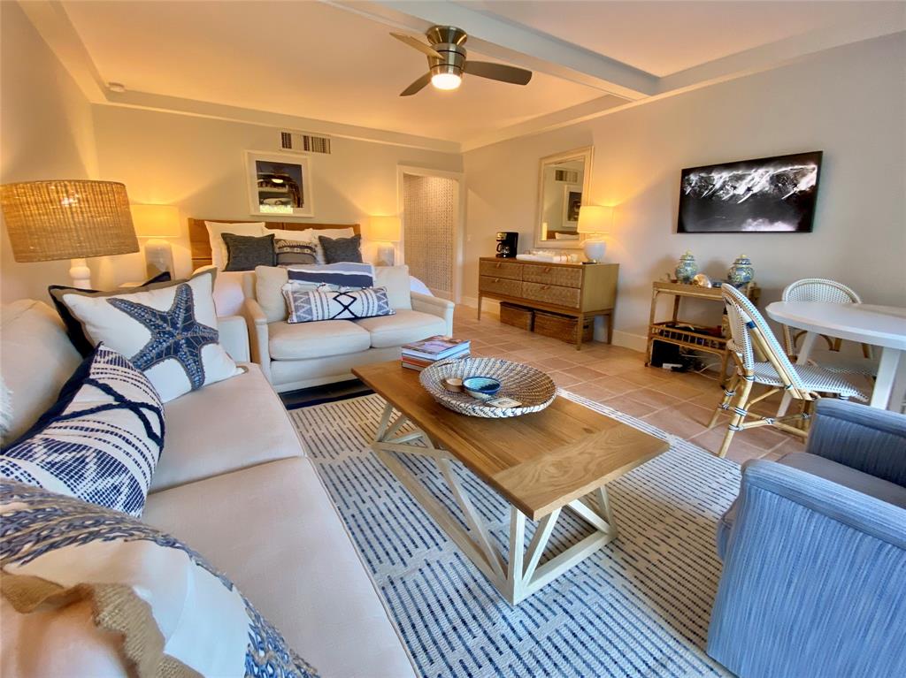 400 Beach Road, Unit 150 Vero Beach, FL 32963 - Photo 8 of 21 a living room with furniture and wooden floor