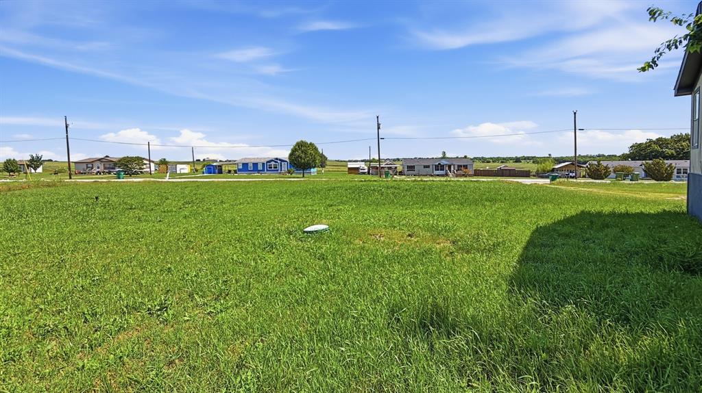 185 Private Road 4437 Rhome, TX 76078 - Photo 24 of 28 Expansive open lot featuring natural grassland