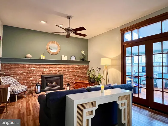 a view of a livingroom with furniture and a fireplace