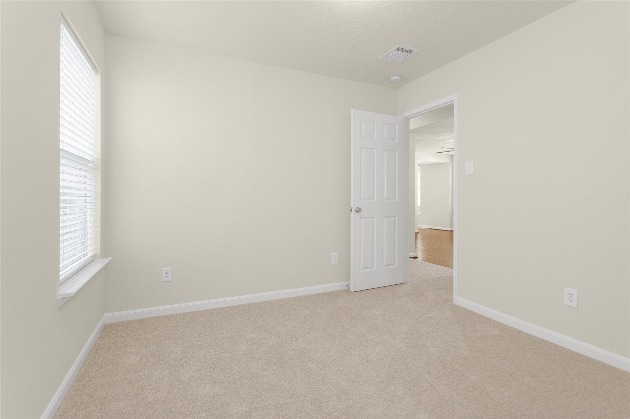 3131 Beacon Grove Street Spring, TX 77389 - Photo 23 of 38 a view of an empty room with a window