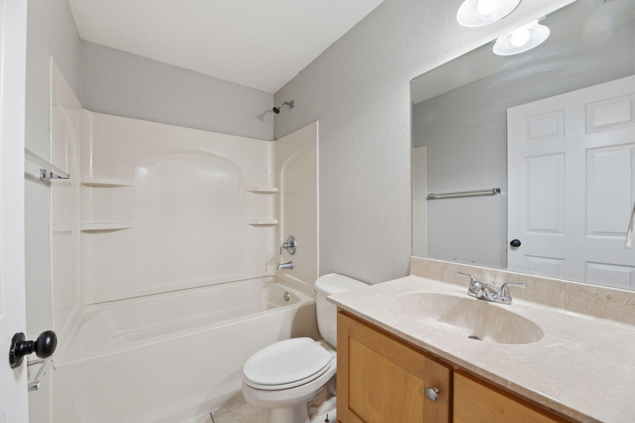 15731 85th Road North Loxahatchee, FL 33470 - Photo 38 of 65 a bathroom with a granite countertop sink toilet and shower