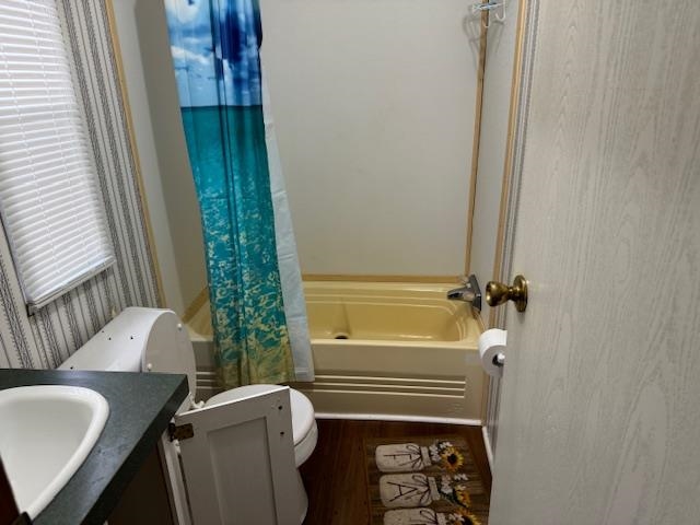 367 Eldie Foster Road Pocahontas, TN 38061 - Photo 11 of 14 Bathroom with wood finished floors, toilet, vanity, and shower / bath combo