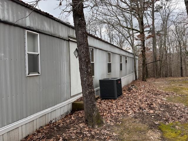 367 Eldie Foster Road Pocahontas, TN 38061 - Photo 3 of 14 View of side of home featuring cooling unit