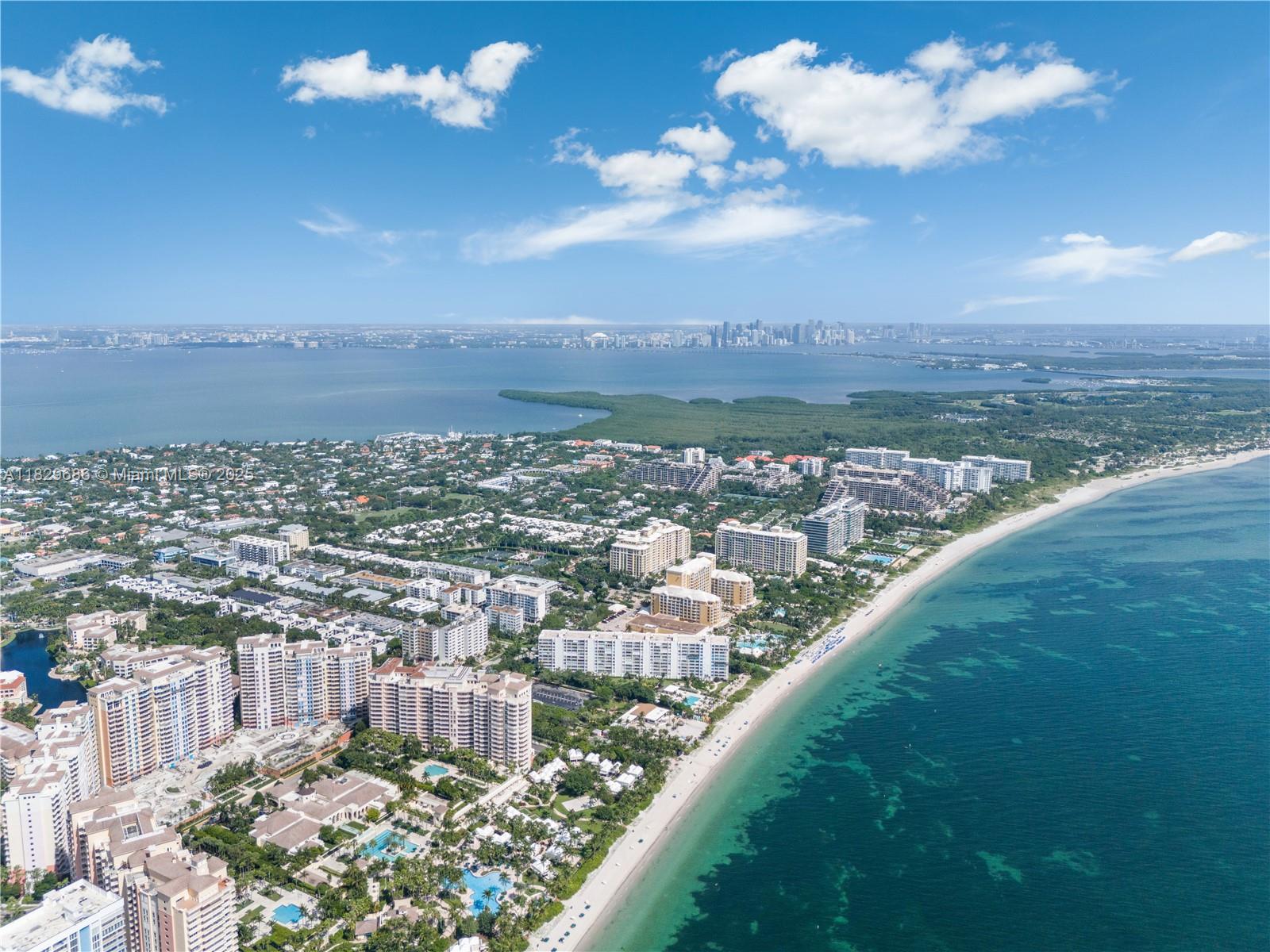 609 Ocean Drive, Unit 5H Key Biscayne, FL 33149 - Photo 23 of 28 a view of a city with lots of green space