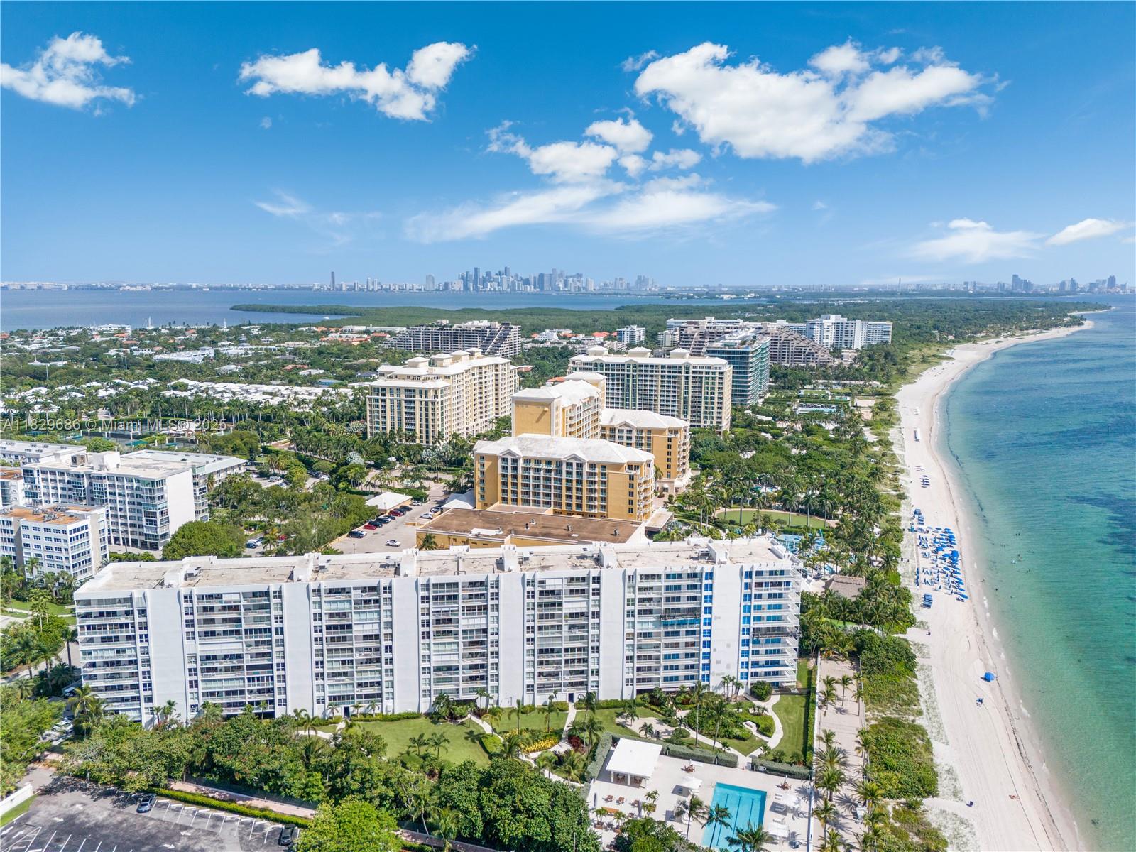 609 Ocean Drive, Unit 5H Key Biscayne, FL 33149 - Photo 25 of 28 a view of a city with tall buildings