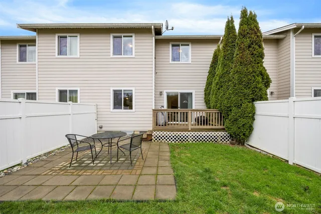 a view of backyard with a garden and plants
