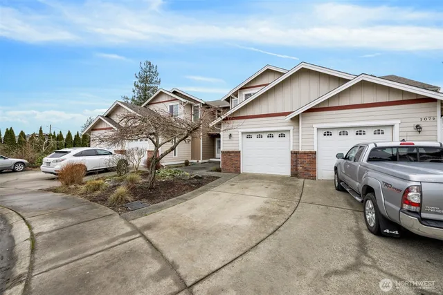 a view of a car park in front of house