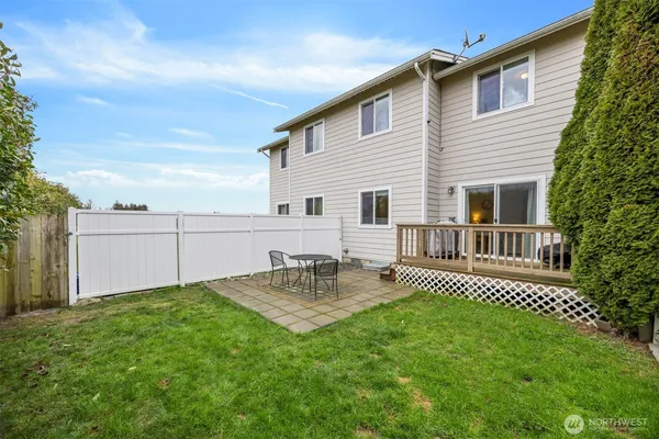 a view of backyard with a garden and plants