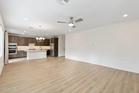 a view of a kitchen with a dishwasher and a refrigerator